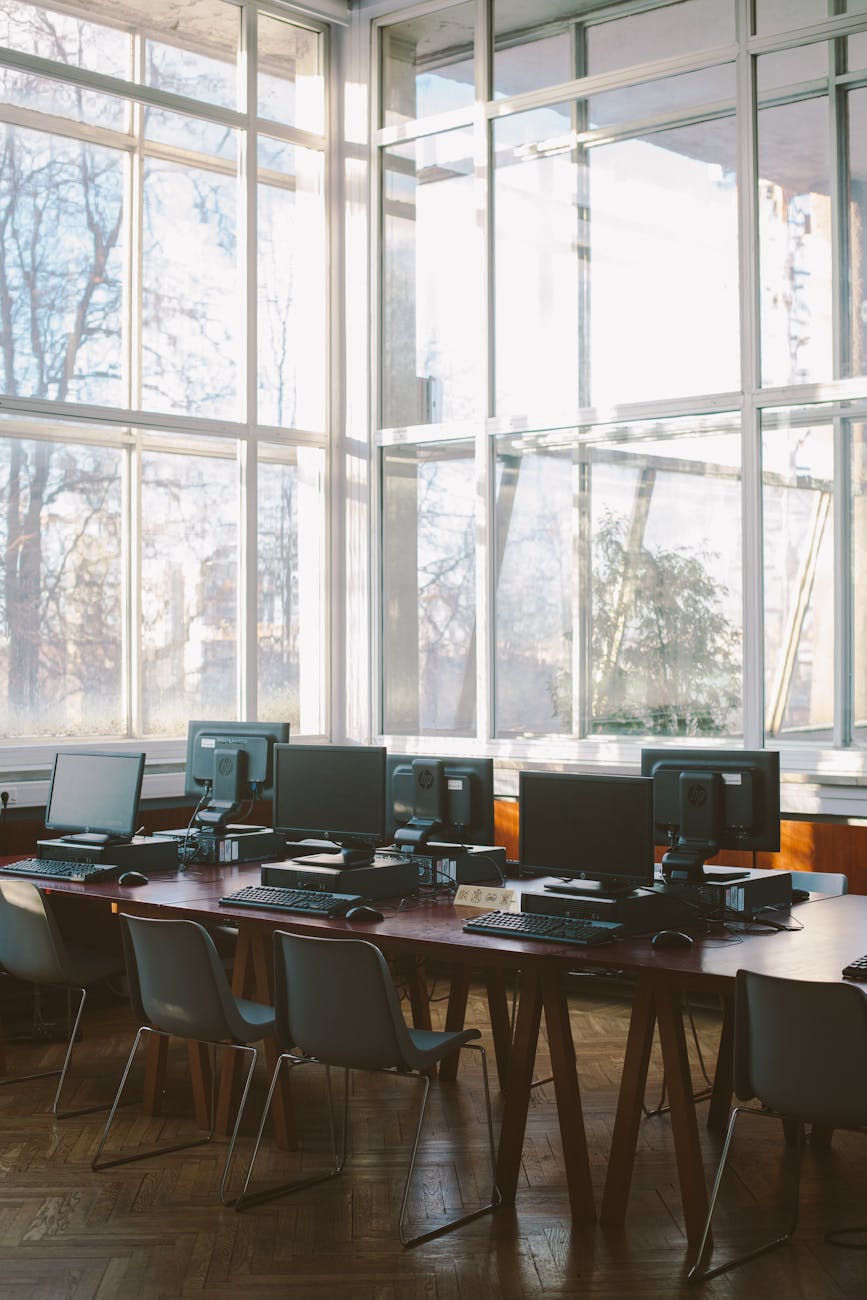 Sunlit computer lab with contemporary design and multiple workstations
